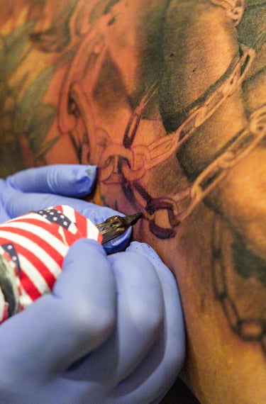 Tattoo session in Miami showing a client getting a design