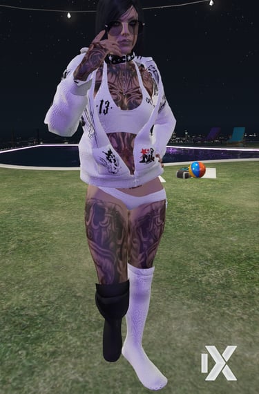 a woman with tattoos on her body and a tattoo on her chest