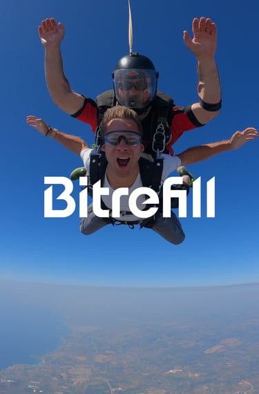 Person skydiving screaming into camera