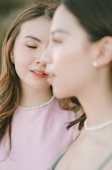 Close portrait detail of two friends during photoshoot at Geger Beach Nusa Dua Bali