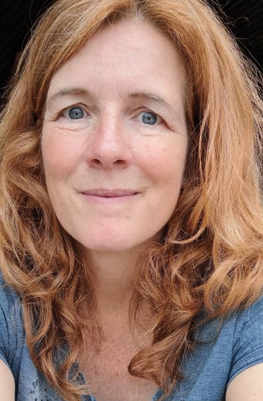 a woman with red hair and blue eyes nathalie van der stelt