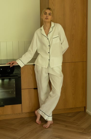 a woman in a white pajamas and pajamas