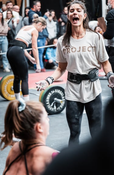 a woman in a white shirt and black pants