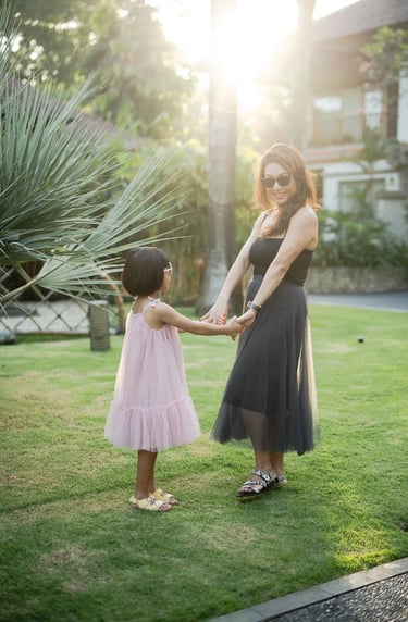 Golden hour family photography session at Padma Resort Legian Bali with calm tropical garden atmosphere.