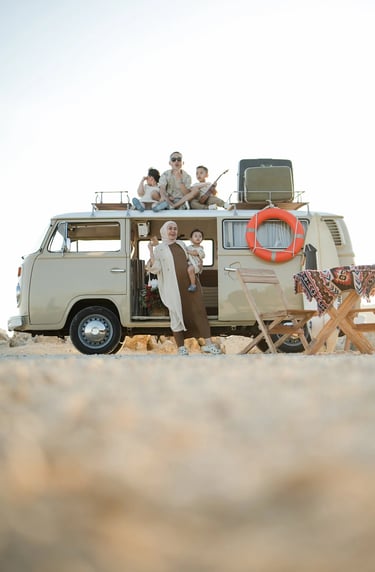 Ilham family enjoying a retro combi family photography session at Melasti Beach Bali during sunset