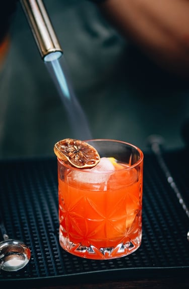 A cocktail in an Old Fashioned glass