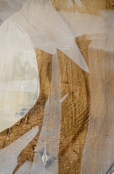 Abstract painting with gold, white, and grey brushstrokes, showcasing modern texture and canvas detail.