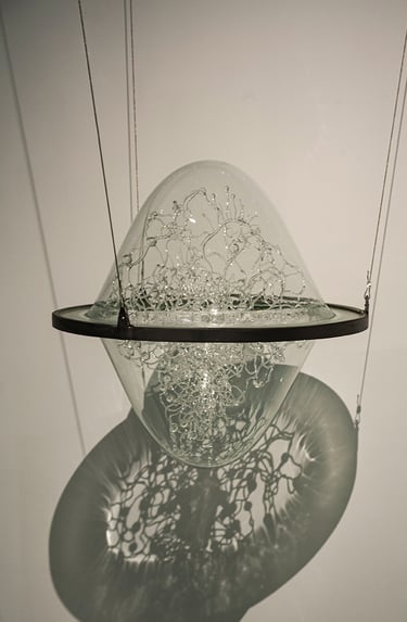 a glass sculpture in the air