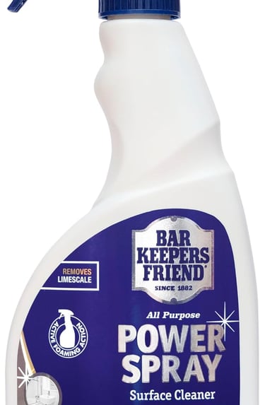 Bar Keepers Friend Power Spray surface cleaner bottle for removing limescale and kitchen grease.
