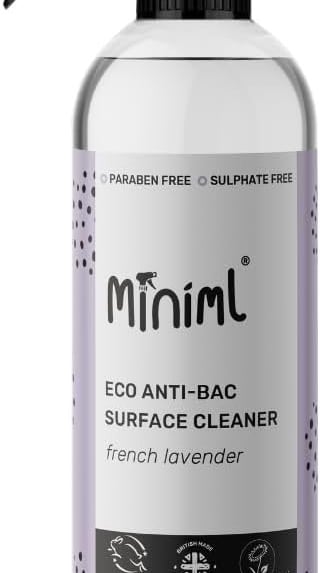 a spray bottle of minimil eco - friendly cleaner