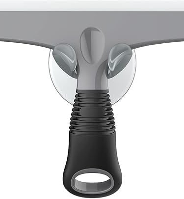 a large knife and a knife on a table