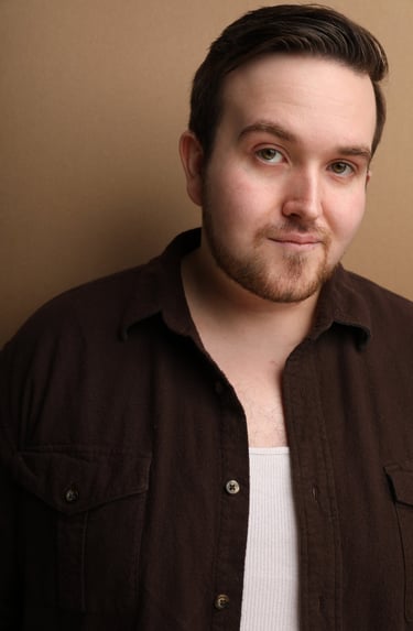 Cade MacFee actor headshot on a brown background