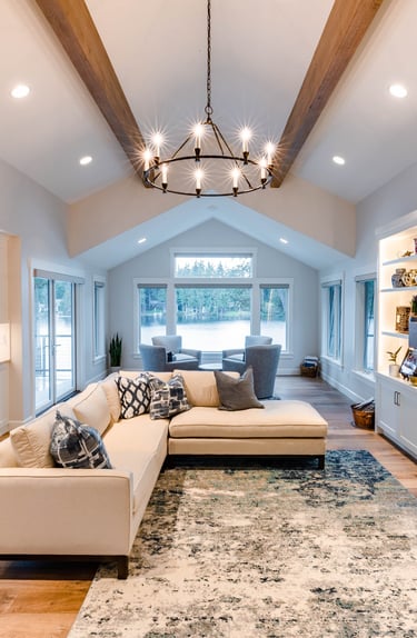 Gorgeous open living room with wood beams