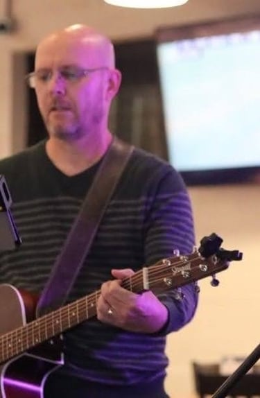 William Finn from Finn's Echo performing in front of live audience