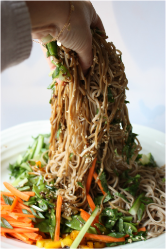 mixing Potluck soba salad
