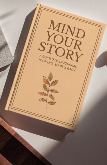 Mind Your Story guided daily journal with an autumn leaf illustration on a tan cover.