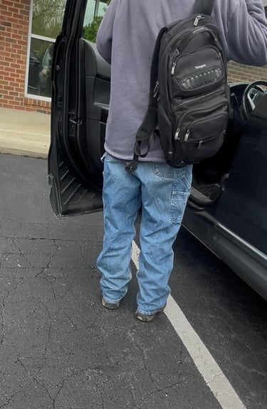 Car lockout service in Asheville NC with locksmith opening car door