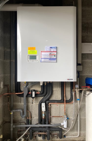 Remplacement de chaudière réalisé par Qualiplomberie, entreprise de plomberie certifiée RGE