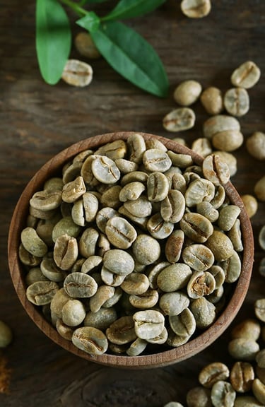 a bowl of coffee beans and a bowl of coffee beans