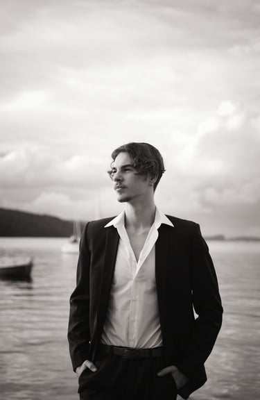 a man in a suit and white shirt