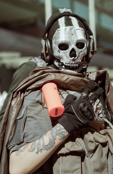 osplayer as Ghost from Call of Duty: Modern Warfare 2 at IFEMA Madrid. Features skull mask, tactical gear, and British flag p