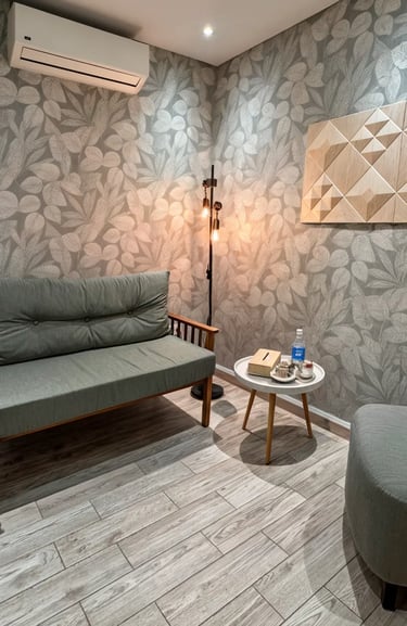 a living room with a couch and a chair