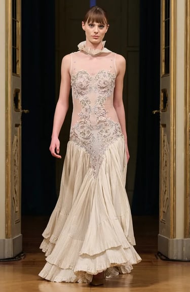 Anton Giulio Grande Spring/Summer 2026 Ivory embroidered dress with tiered pleated hem.