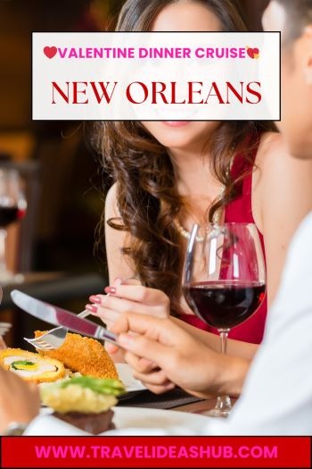 a couple of people sitting at a table with a glass of wine
