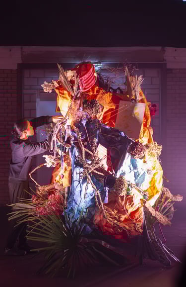 Community-collected objects in 'Menhir Tapestry 1' ikebana performance, PF25 cultural projects