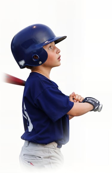 Youth players wear Baseball Badge helmet decals and work toward higher ranks.