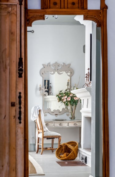 Master Suite at Finca Santa Katerina, showing antique furnitures and a fireplace