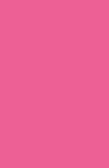 a banana peeler sitting on top of a pink background
