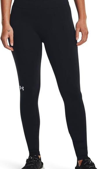 a woman in a black sports bracquett and black leggings