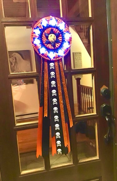 Rosettes d'Halloween avec ou sans jeu de lumières. Idéal pour porte d'entré. 13''X40'' approximatif.