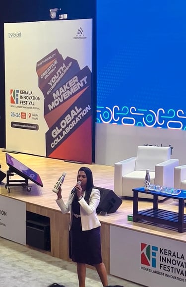 Keala innovation festival host is holding liquisip bottle