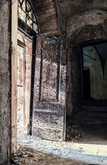Abandoned underground stone corridor inside an old castle connected to paranormal exploration