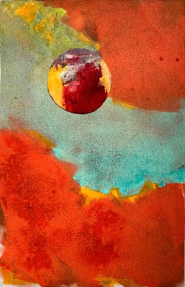 monoprint of orb on orange and blue background
