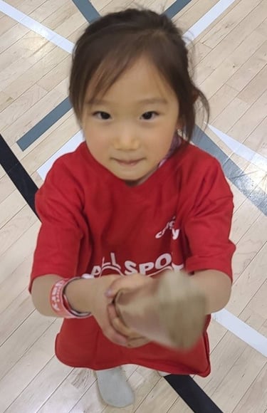 child with tanto in calgary aikido class