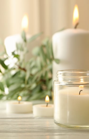 a candle with candles and candles on a table
