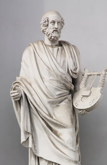 a statue of a man with a fan in his hand