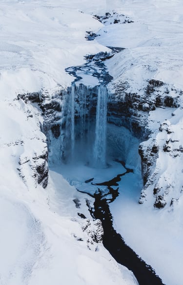 a waterfall in the snow 