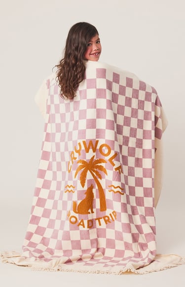 Product photography - a woman in a checkered blanket
