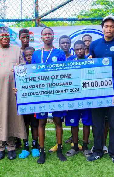 a group of people standing around a giant check checkered checkered checkered check
