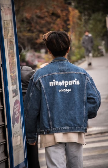 a man in a denim jacket and jeans jacket, from the brand ninetparis vintage which is written