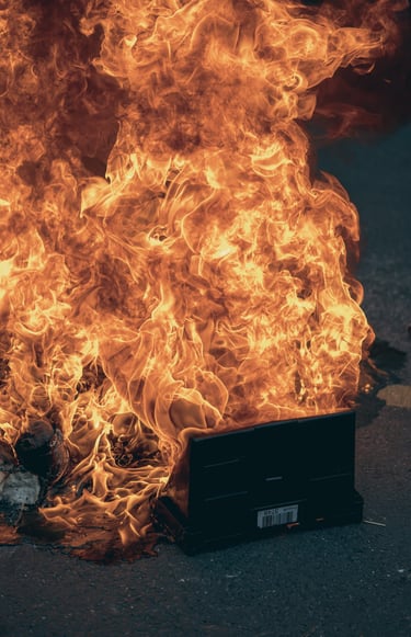 a box of fire on the ground. Manifestation 2023 in France