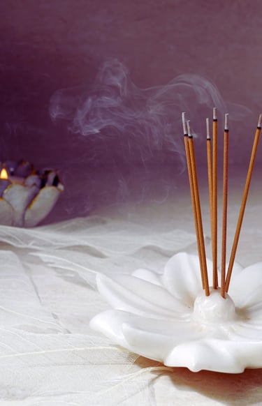 three candles are sitting on a table