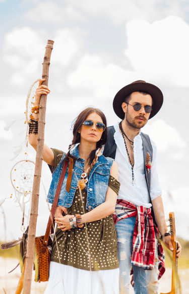 a man and woman standing in the desert