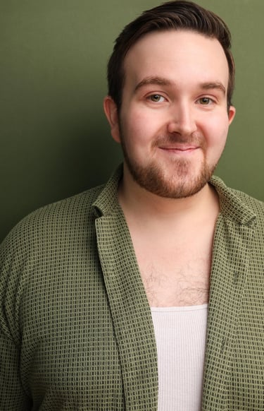 Cade MacFee actor headshot on a green background