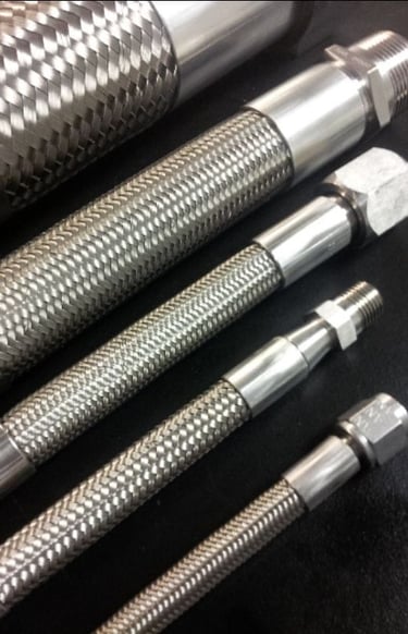 a bunch of different types of metal pipes and pipes