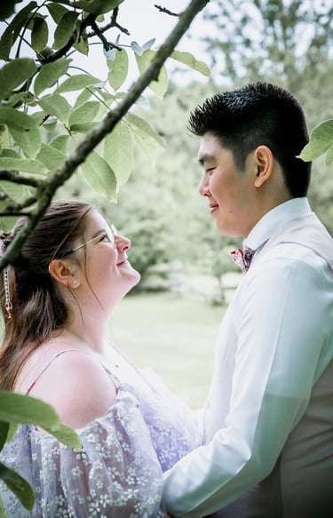 a man and woman standing next to each other